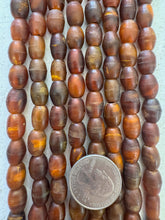 red golden vintage stock horn, 12x9mm barrel, 15" strand, SOLD PER STRAND