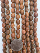 goldstone, 10x7mm barrel, 15" strand, SOLD PER STRAND
