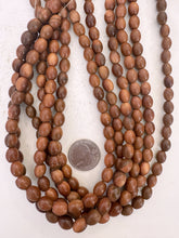 goldstone, 10x7mm barrel, 15" strand, SOLD PER STRAND