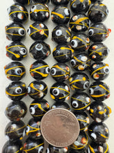 black white yellow red, dotted swirl motif, vintage stock glass, 14mm round raised dots, 6" strand, SOLD PER STRAND