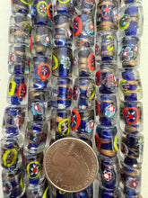 clear blue multi, inside line millefiori motif, vintage stock glass, 14x10mm tube, 6" strand, SOLD PER STRAND
