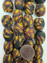 matte brown yellow black millefiori motif, vintage look glass, 24x18mm bowed barrel mix,   6" strand, SOLD PER STRAND
