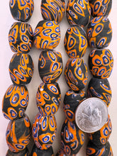matte orange blue white black millefiori motif, vintage look glass, 24x18mm bowed barrel mix, 6" strand, SOLD PER STRAND
