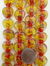 clear red orange yellow, inside lined swirl motif, vintage stock glass, 21x18x9mm heart,  6" strand, SOLD PER STRAND