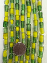clear yellow green, inside lined motif, vintage stock glass, 19x10mm tube,   6" strand, SOLD PER STRAND