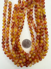 color enhanced quartz: orange red, 8mm round, 15" strand,   SOLD PER STRAND