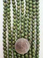 color enhanced pyrite: green, 6mm round, 15" strand,  SOLD PER STRAND