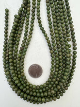 color enhanced pyrite: green, 6mm round, 15" strand,  SOLD PER STRAND