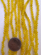 color enhanced quartz: electric yellow, 4mm round, 15" strand,  SOLD PER STRAND