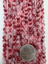 color enhanced quartz: off white dark red magenta, 6mm round, 15" strand,   SOLD PER STRAND