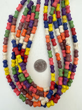 color enhanced magnesite: multi color, 14x8mm dog bone tube, 15" strand,  SOLD PER STRAND