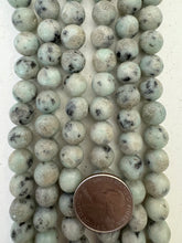 kiwi quartz, matte finish, 10mm round, 15" strand,   SOLD PER STRAND