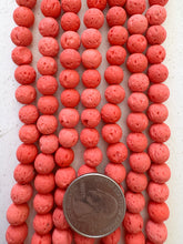 color enhanced lava rock: pale tangerin orange, 8mm round, 15" strand, SOLD PER STRAND