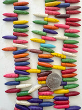 color enhanced magnesite: multi color, 25x6x6mm point pendants, 15" strand, SOLD PER STRAND