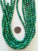 color enhanced magnesite: turquoise blue pale green, 6mm round, 15" strand,  SOLD PER STRAND