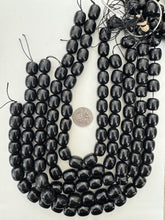 obsidian, 11x11x7mm barrel, 15" strand, sold per strand