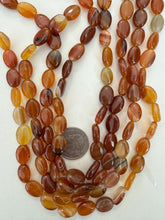 carnelian, 14x10x6mm oval, 15" strand, sold per strand