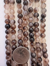 color enhanced quartz: brown purple off white, 8mm round, 15" strand,  SOLD PER STRAND
