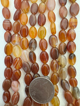 carnelian, 12x9x5mm oval, 15" strand,  SOLD PER STRAND