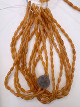 red aventurine, 18x5mm bowed tube, 15" strand, sold per strand