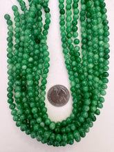 color enhanced quartz: emerald green, 6mm round, 15" strand,  SOLD PER STRAND