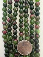 color enhanced quartz: dark olive green ruby red, 8mm faceted round, 15" strand,   SOLD PER STRAND