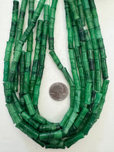 color enhanced quartz: light and dark emerald green, 26x7mm carved tube, 15" strand,  SOLD PER STRAND