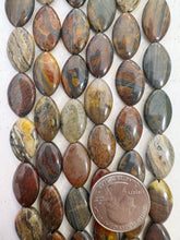 red wooden jasper, 18x12x5mm horse eye oval, 15" strand,  SOLD PER STRAND