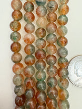 color enhanced quartz dark orange green off white, 8mm round,  15" strand,    SOLD PER STRAND