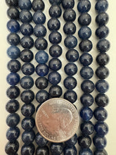 color enhanced quartz: dark blue,  8mm round, 15" strand,  SOLD PER STRAND