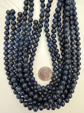 color enhanced quartz: dark blue,  8mm round, 15" strand,  SOLD PER STRAND