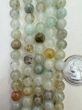 color enhanced quartz: pale mint green, 8mm round, 15" strand,   SOLD PER STRAND