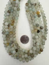 color enhanced quartz: pale mint green, 8mm round, 15" strand,   SOLD PER STRAND