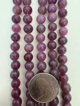color enhanced quartz: pale dark red purple, 8mm round, 15" strand,  SOLD PER STRAND