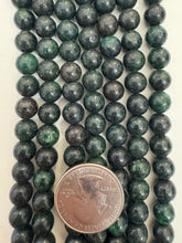 color enhanced serpentine: very dark green, 8mm round, 15" strand, SOLD PER STRAND