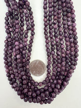 color enhanced serpentine: royal red purple, 6mm faceted round, 15" strand,  SOLD PER STRAND