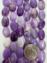 color enhanced quartz: purple, 17x13x6mm oval, 15" strand,  SOLD PER STRAND