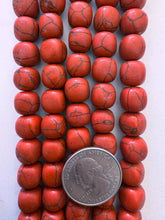 color enhanced magnesite: dark pale red, 11mm rounded cube, 15" strand, SOLD PER STRAND