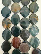 yellow green bloodstone, 29x24x6mm horse eye, 15" strand,  SOLD PER STRAND