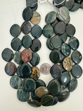 yellow green bloodstone, 29x24x6mm horse eye, 15" strand,  SOLD PER STRAND