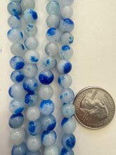 color enhanced quartz: blue off white, 8mm round, 15" strand,  SOLD PER STRAND