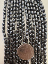 hematite, 6x4mm bowed tube, 15" strand,  SOLD PER STRAND
