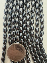 hematite, 8x5mm bowed tube, 15" strand,  SOLD PER STRAND