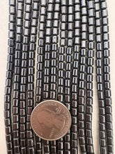 hematite, 4mm barrel, 15" strand,  SOLD PER STRAND