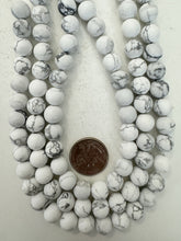 howlite, matte finish, 10mm round, 15" strand, sold per strand