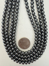 hematite, 6mm round, 15" strand, sold per strand