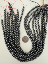 hematite, 6mm round, 15" strand, sold per strand