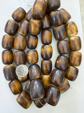 chocolate brown off white, faux bone, vintage look resin, 30x26mm barrel, 15" strand, SOLD PER STRAND