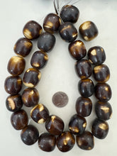brown off white, faux bone, vintage look resin, 26x23mm barrel, 15" strand,  SOLD PER STRAND