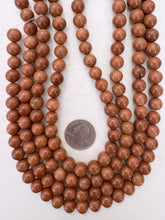 goldstone, 10mm round, 15" strand, sold per strand